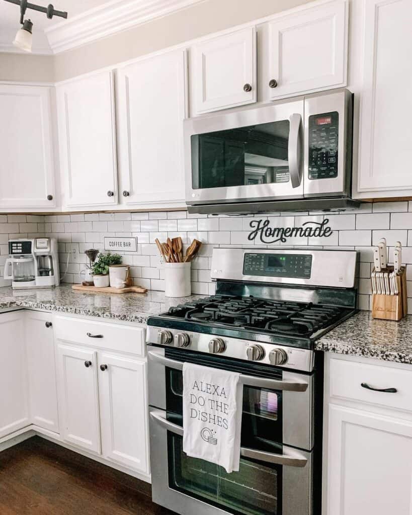White Cabinet Kitchen with Stainless Steel Appliances