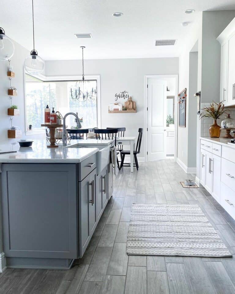 White Cabinets and a Light Grey Island