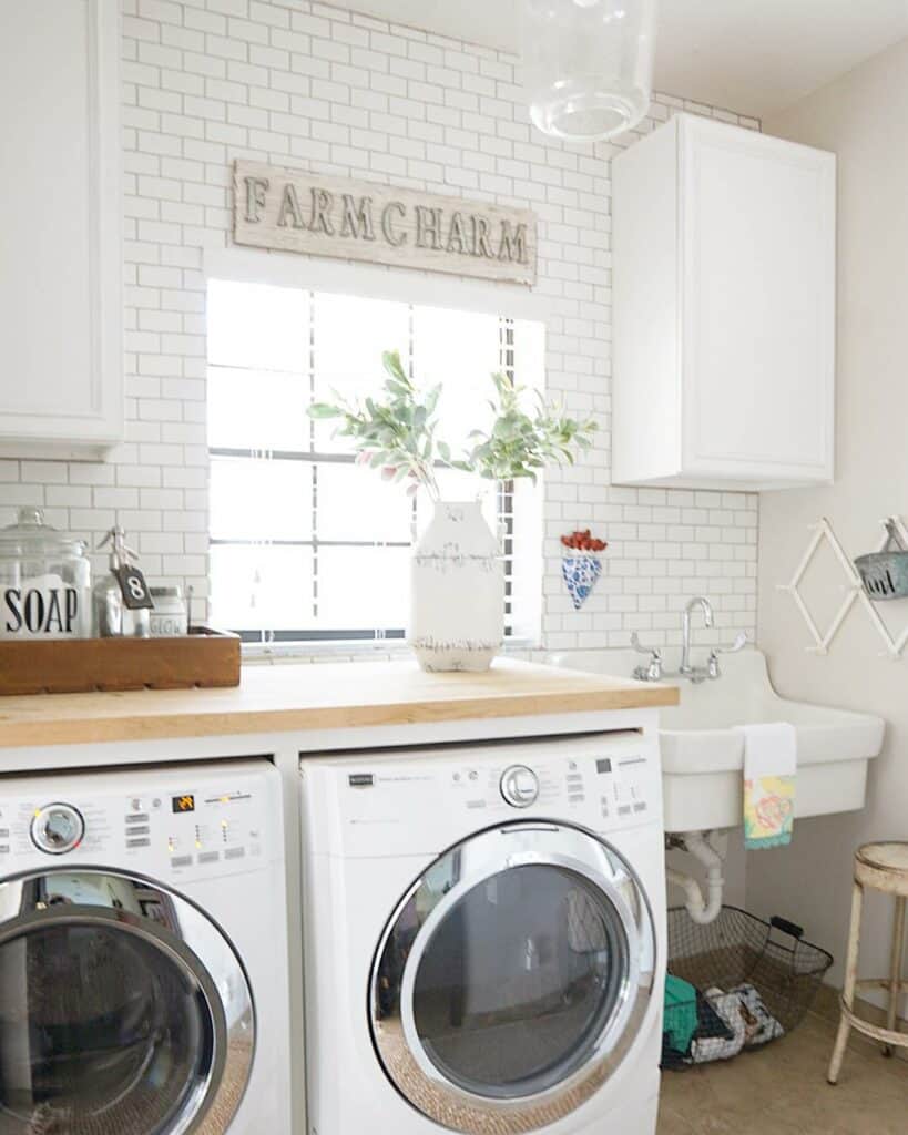 White Cabinets on a White Subway Tile Wall