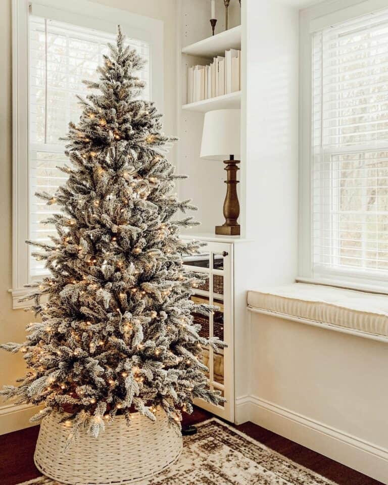 White Christmas Tree on a Dark Wood Floor