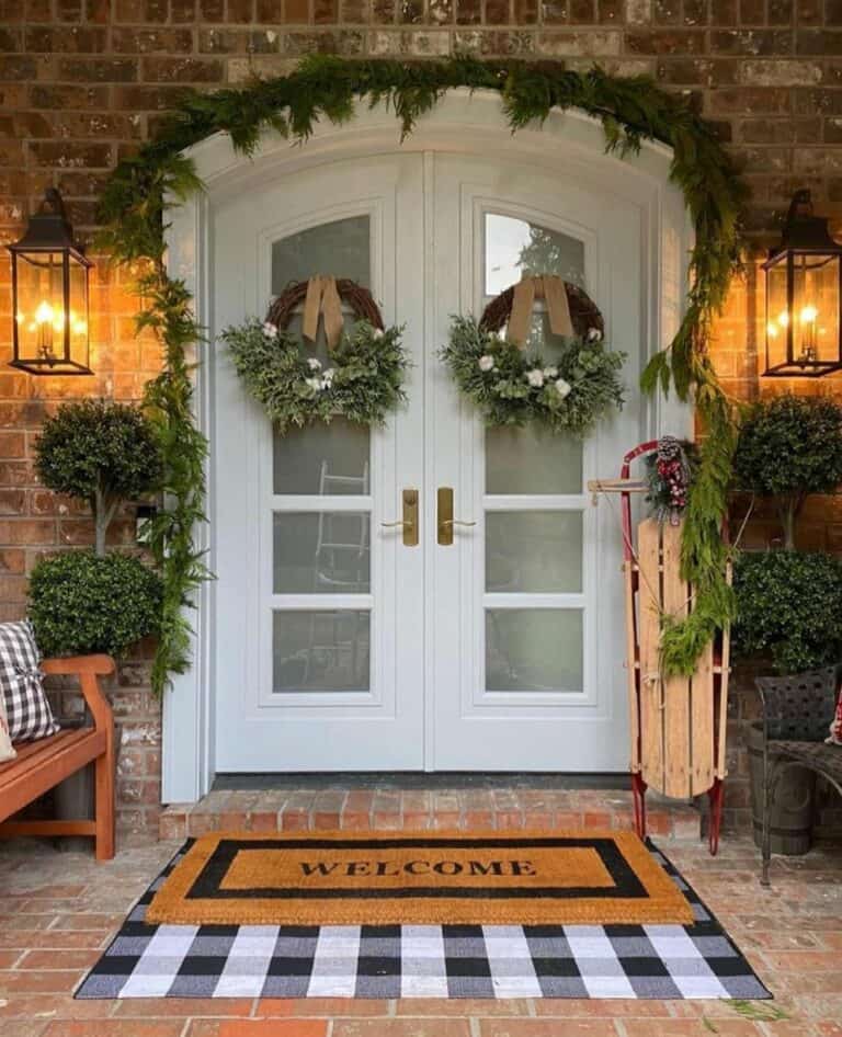 White Double Door With Grapevine Wreath