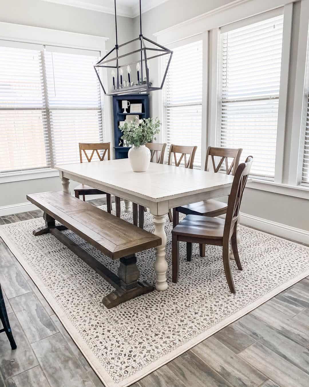 White Farmhouse Dining Table Atop Beige Carpet - Soul & Lane