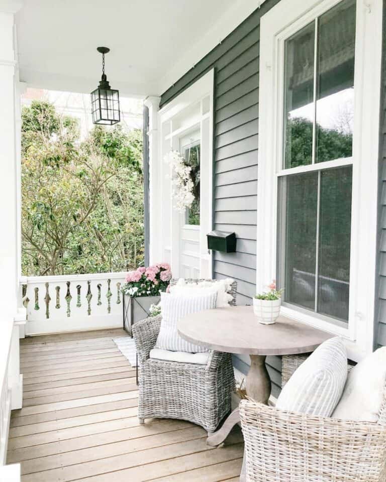 White Farmhouse Railing for Front Porch with Wicker Chairs