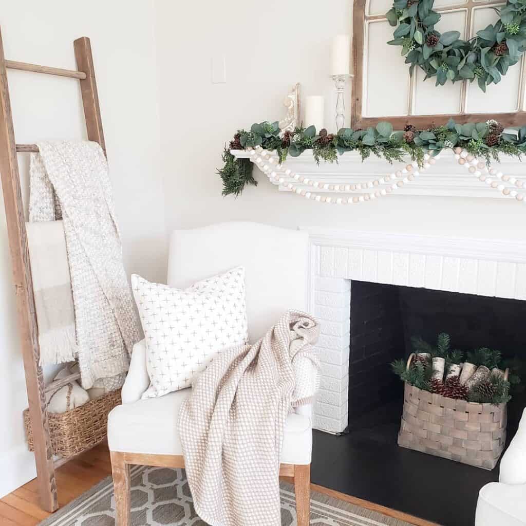 White Fireplace with Winter Greenery