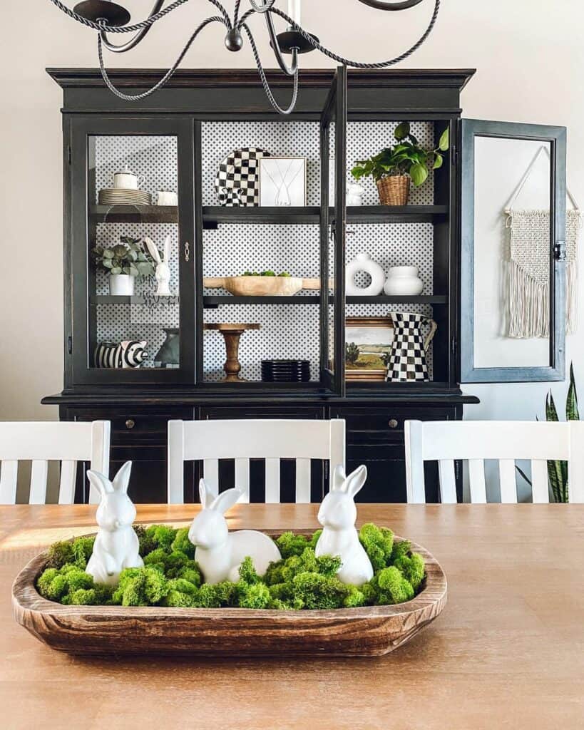 White Rabbits and a Black Display Cabinet