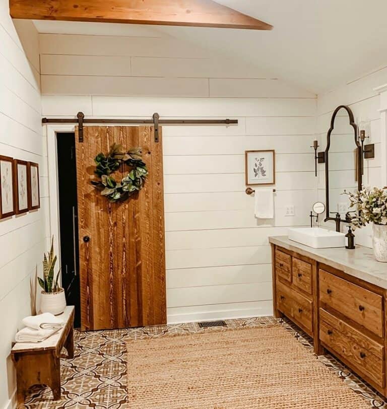 White Shiplap Bathroom with Sliding Wood Door