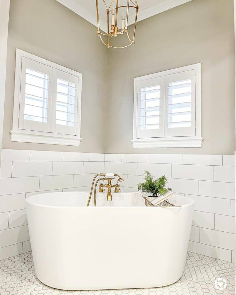 White Shuttered Bathroom Windows in a Gray Corner