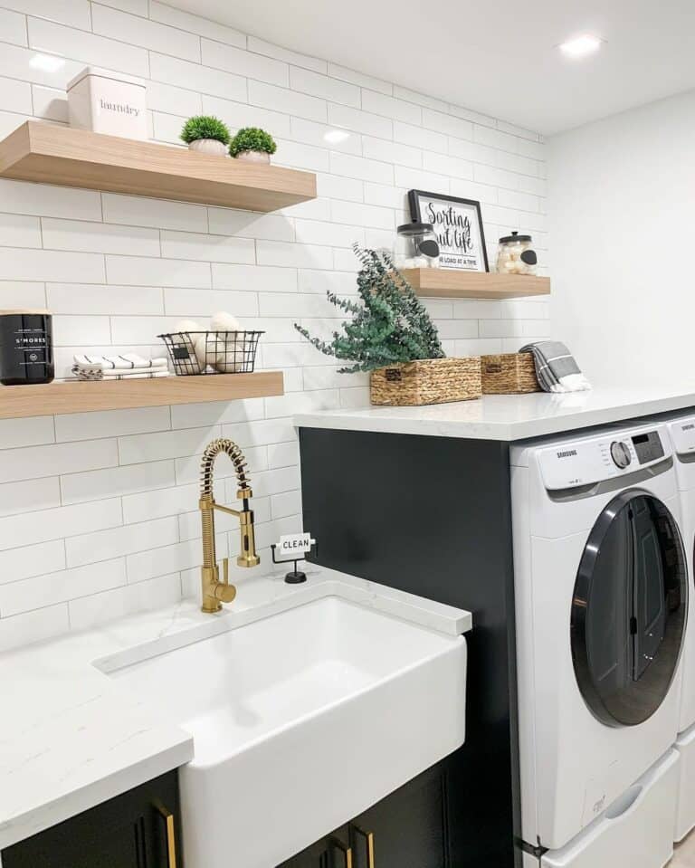 White Subway Tile Laundry Room Wall with Black Cabinetry