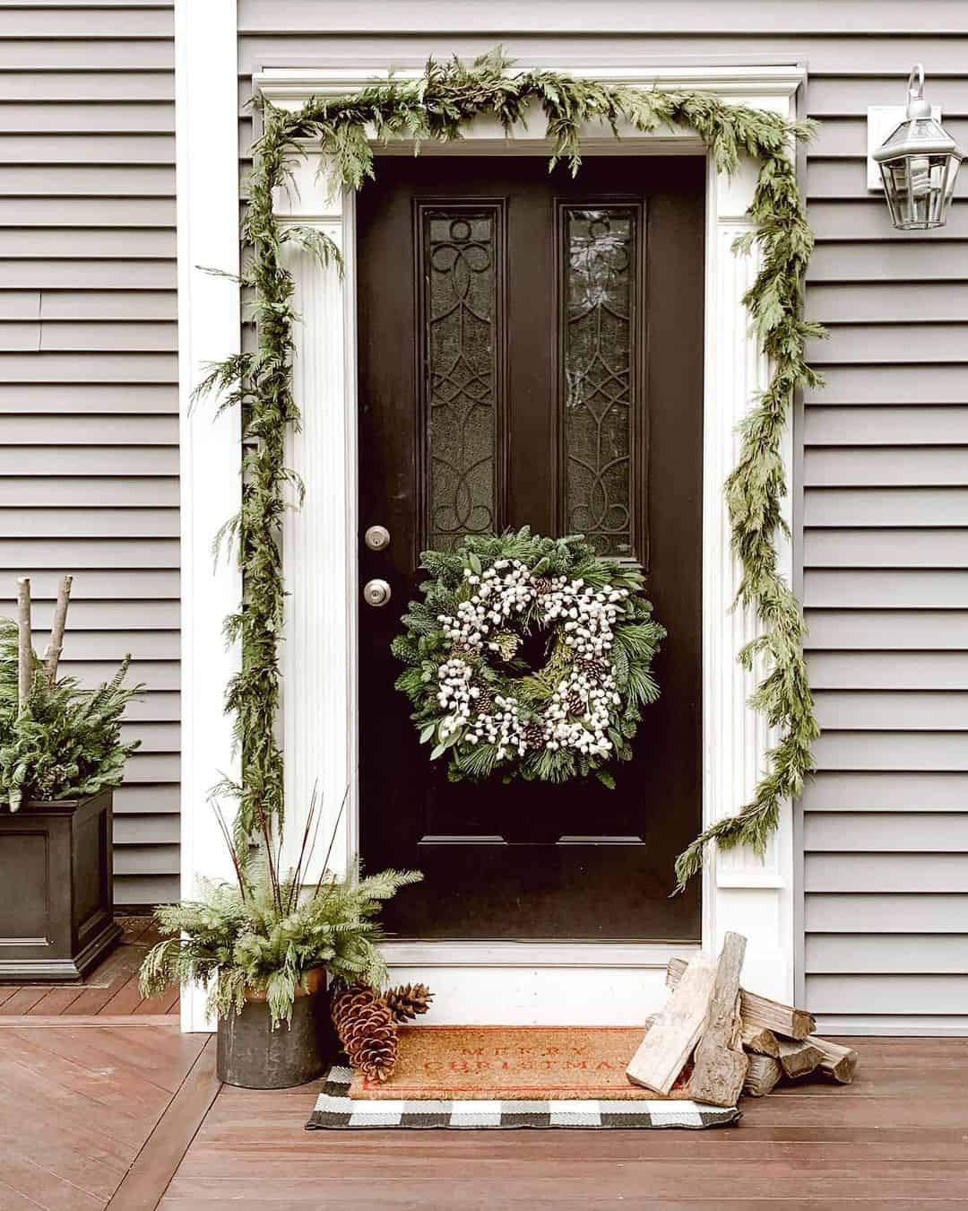 White Trim With Garland Around Black Front Door Soul Lane white-trim-with-garland-around-black-front-door-soul-lane
