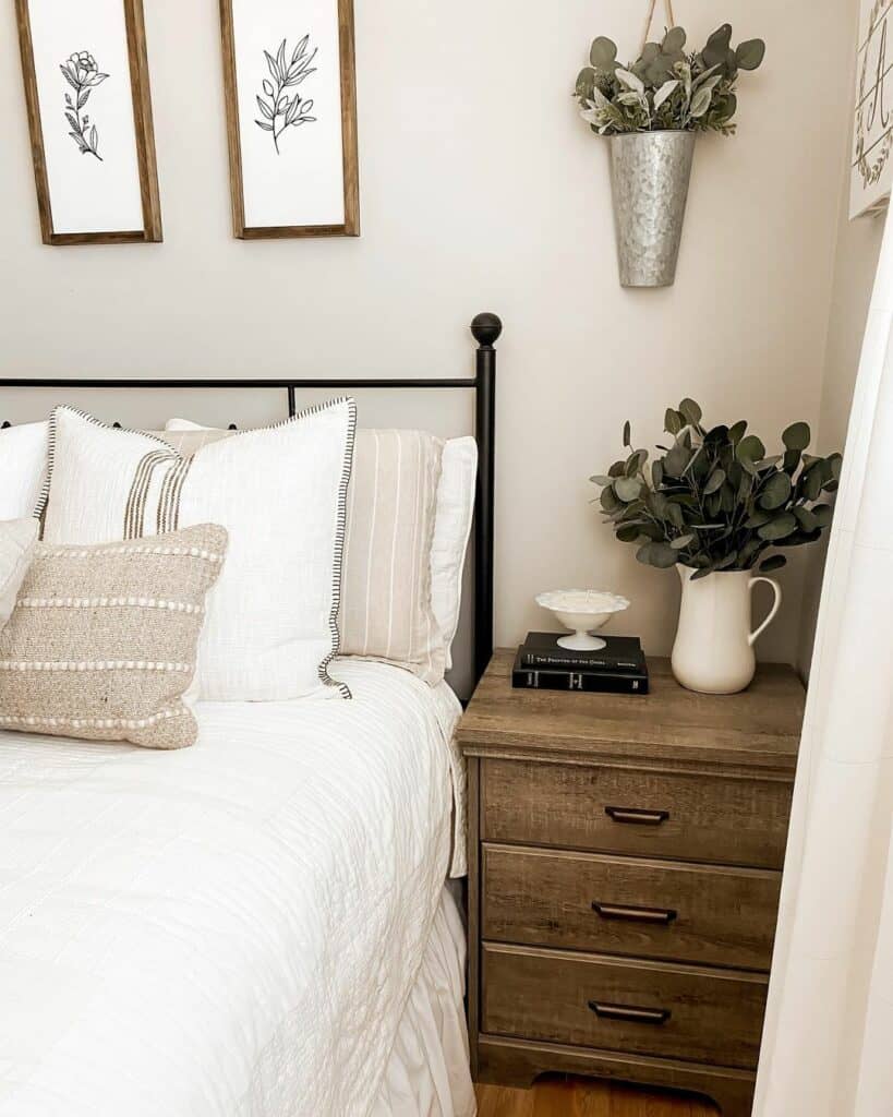 White Vase with Foliage as Nightstand Décor