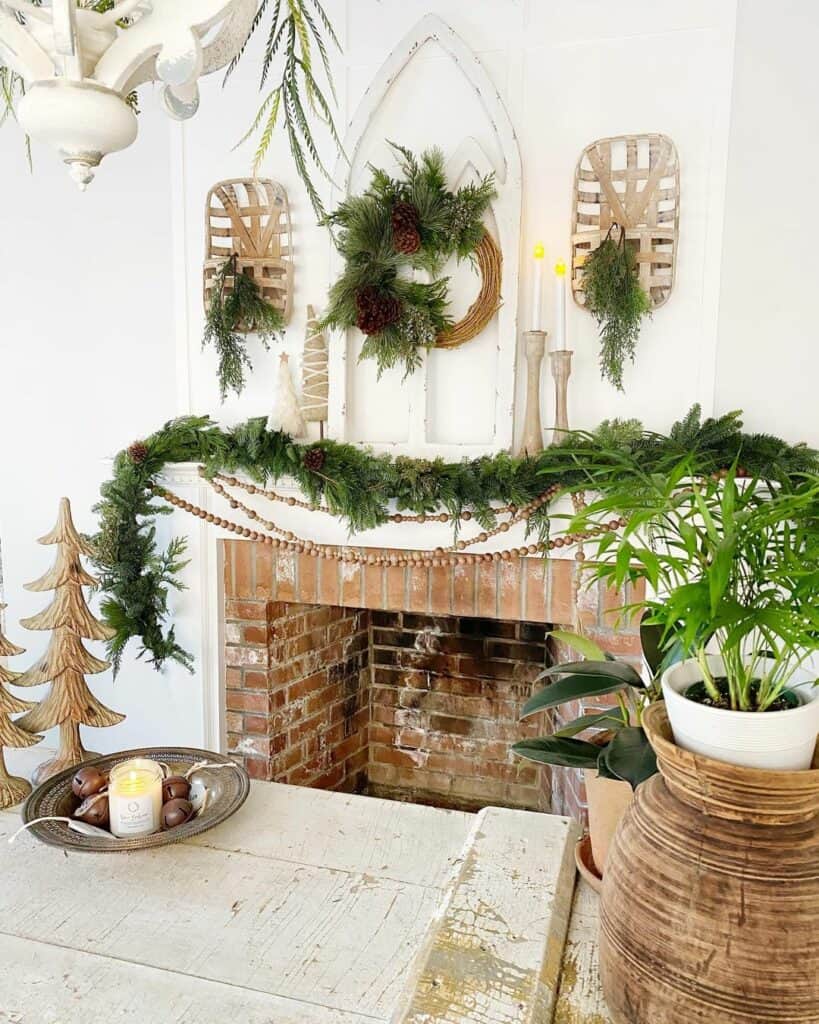 White and Brick Fireplace Mantel with Winter Garland