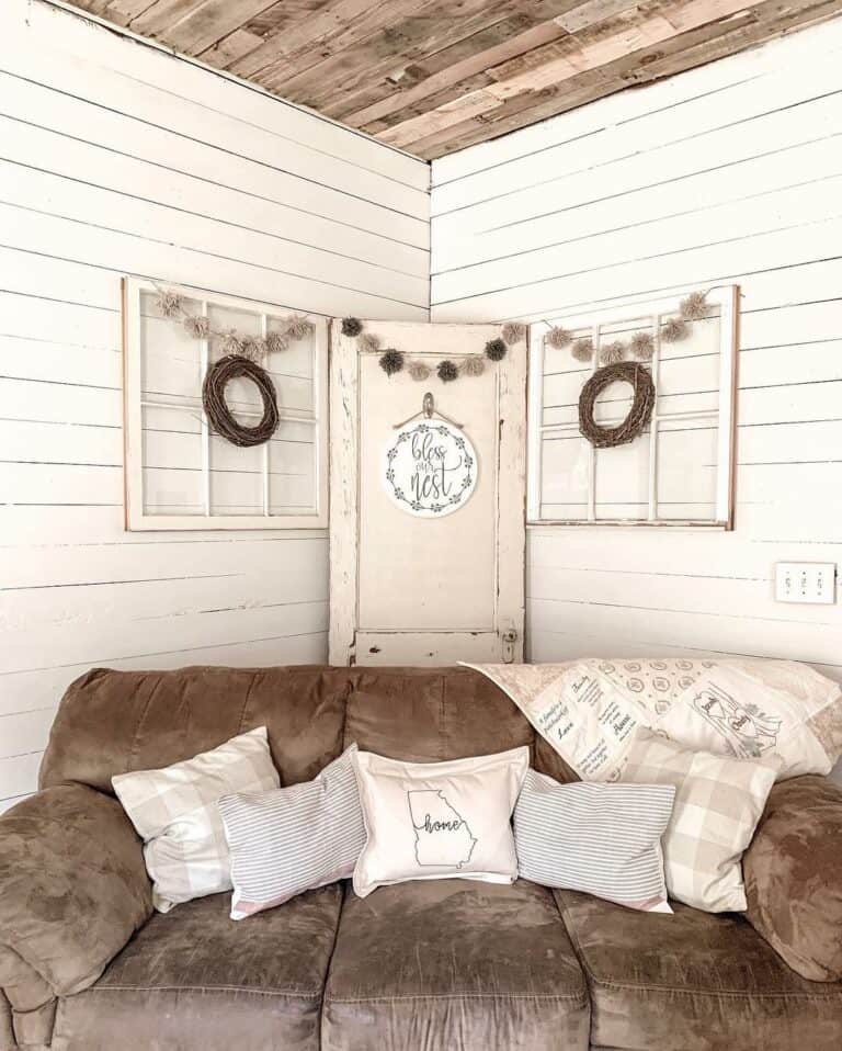 White and Brown Couch Pillows in Shiplap Living Room