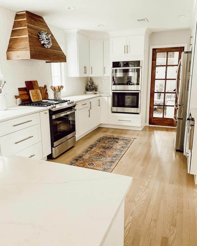 White and Wood Kitchen with Windowpane Door