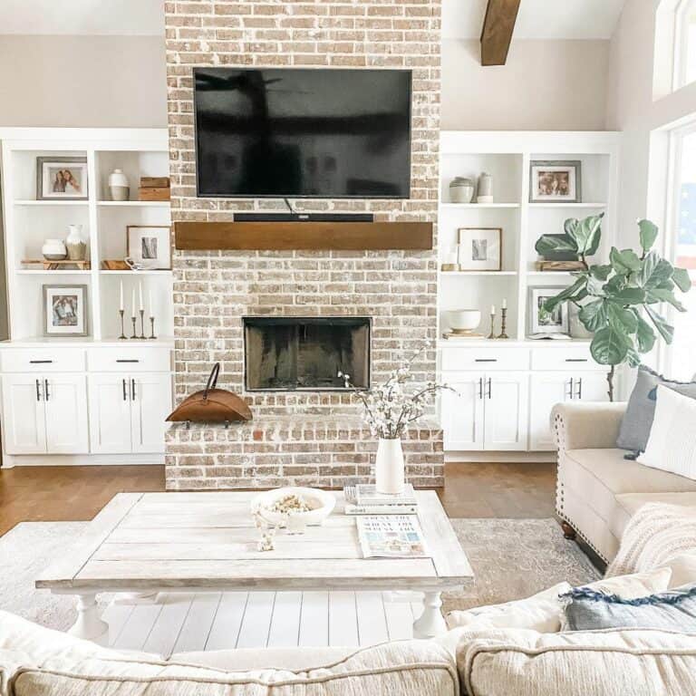 Whitewashed Brick Fireplace Wall with Farmhouse Décor