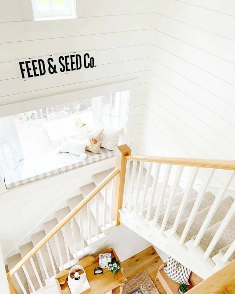 Window Seat Surrounded by White Shiplap