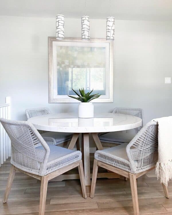 27 Versatile Round White Dining Tables To Accessorize Any Room