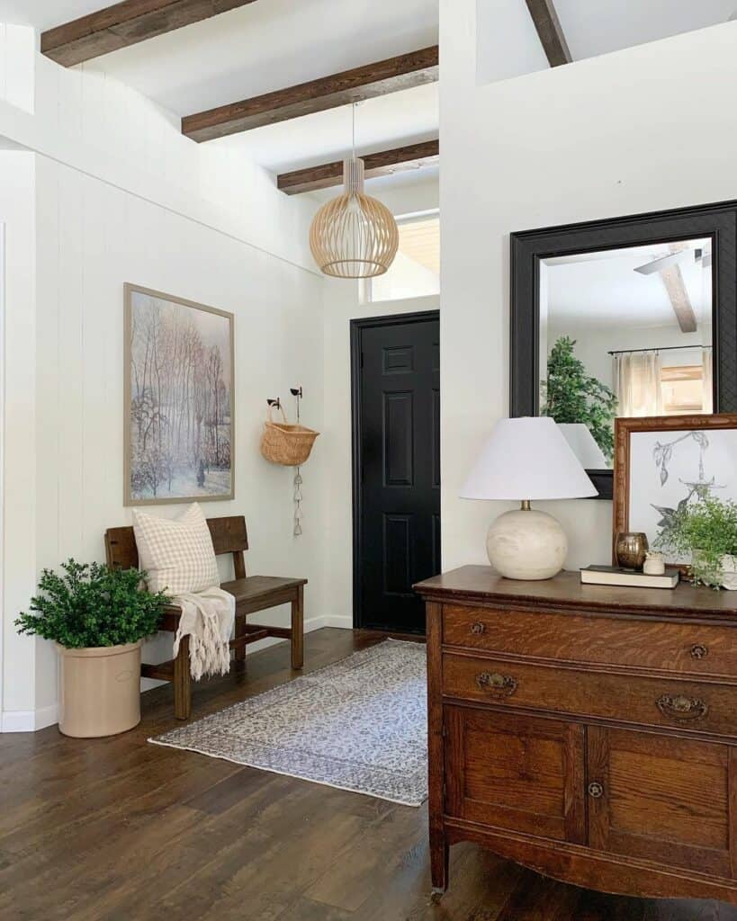 Wood Beam Entryway with Framed Painting