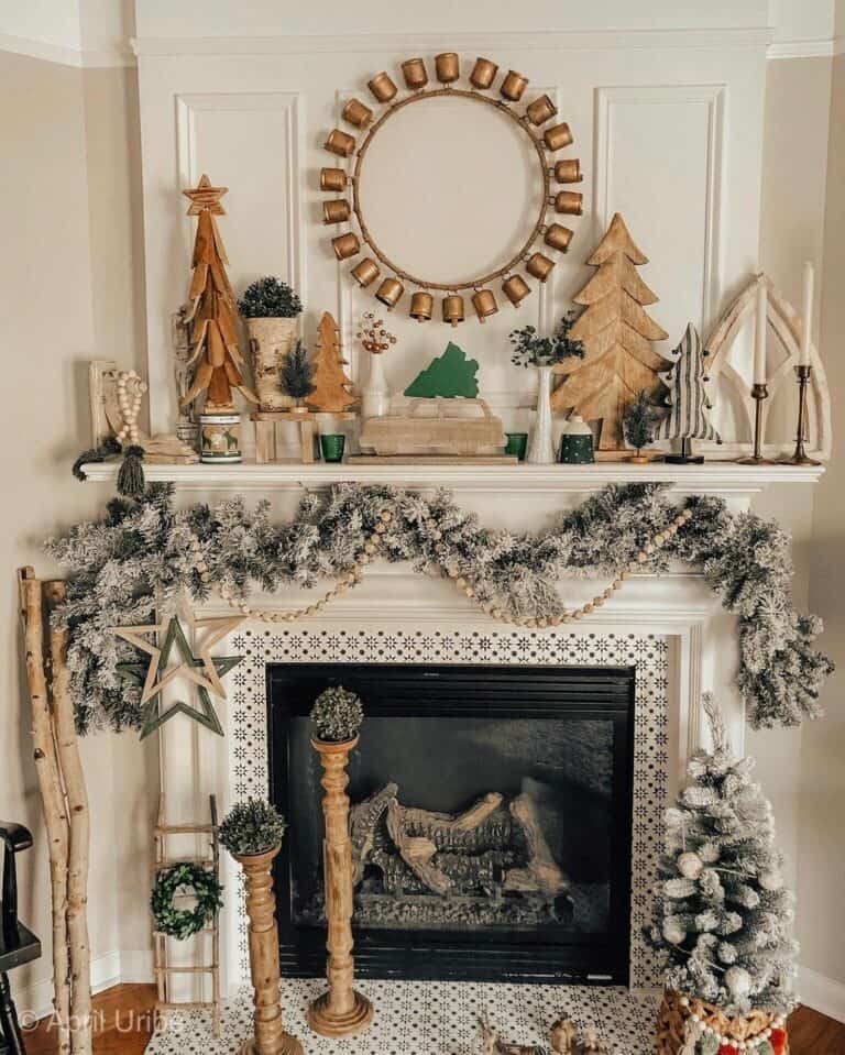 Wreath of Bronze Bells Above White Mantel