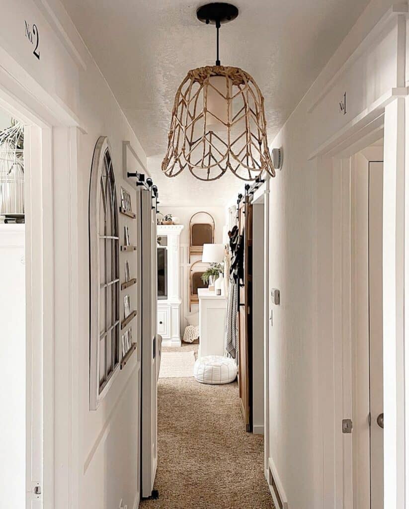 A Gold Pendant Light and White Window Décor