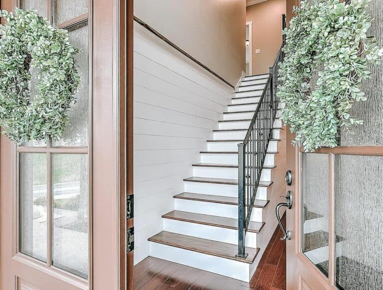 Airy Foyer with Shiplap Wall