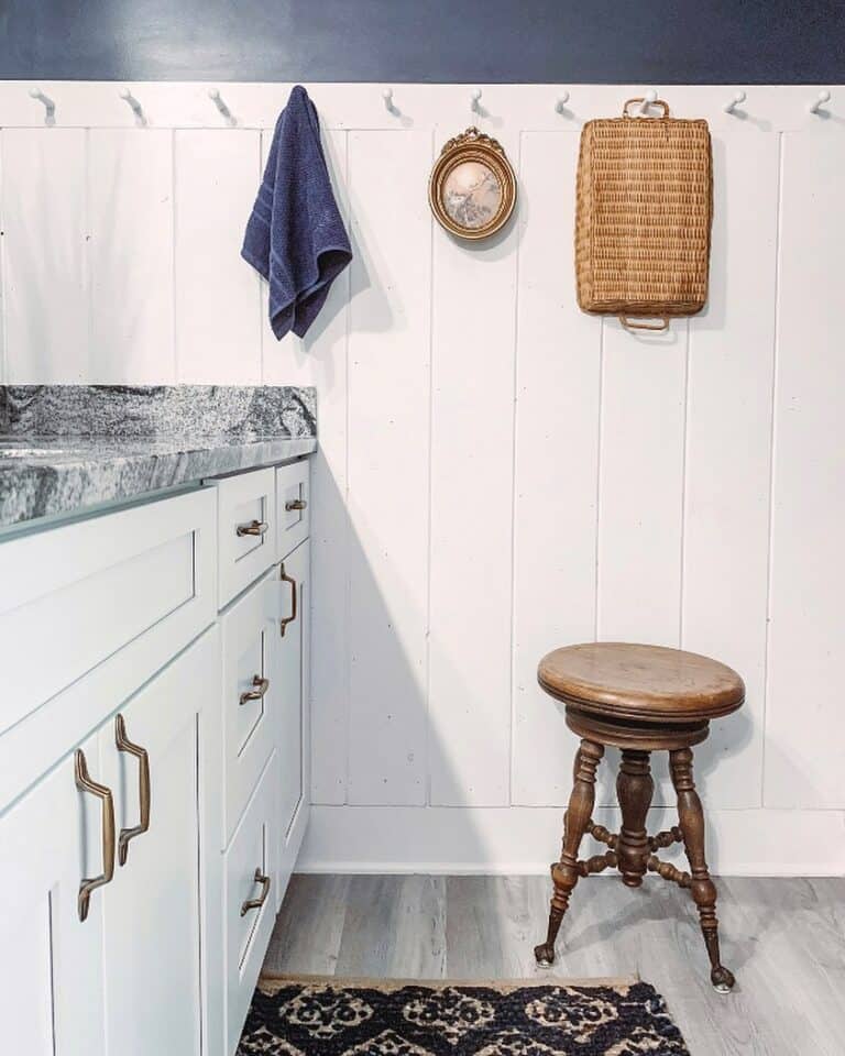 Antique Stained Wood Stool in Bathroom