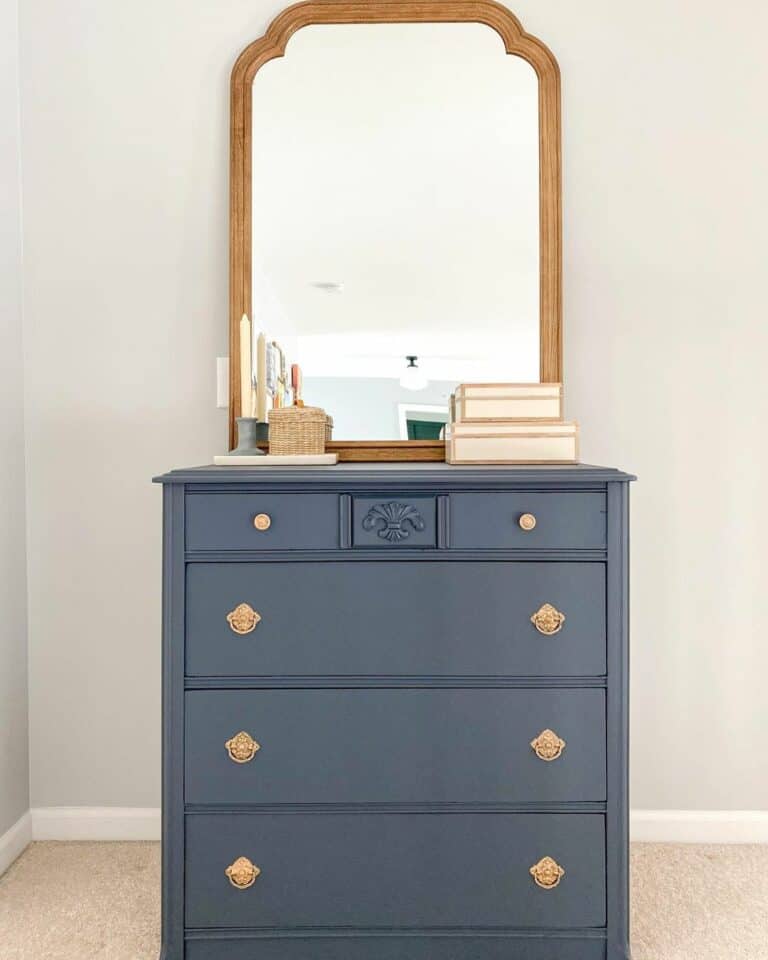 Arched Mirror on Dark Blue Dresser