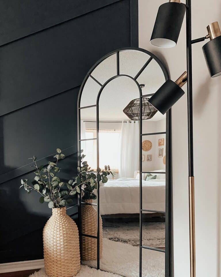 Bedroom with Black and Gold Floor Lamp