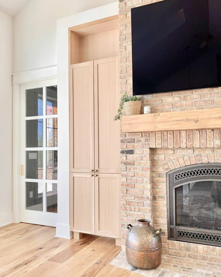 Beige Brick Fireplace with Flat Panel TV
