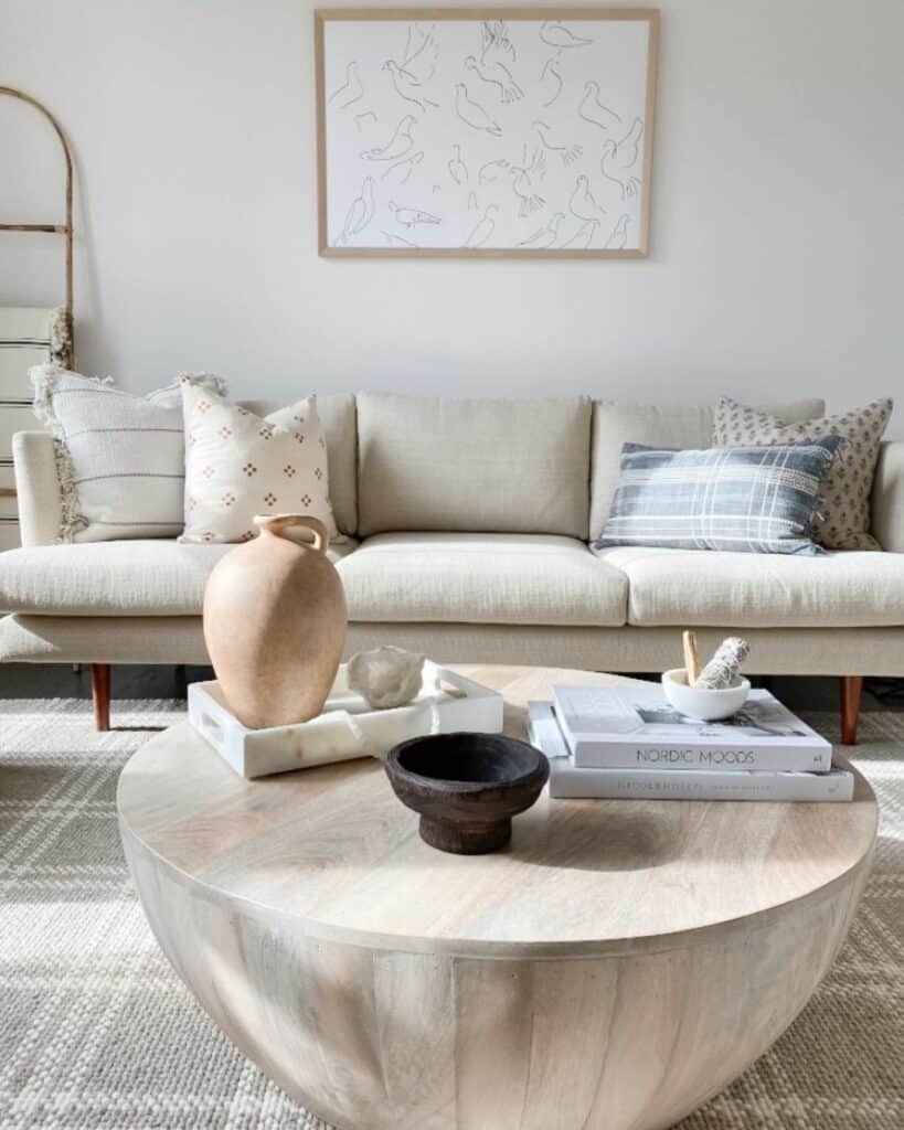 Beige Couch and Round Coffee Table