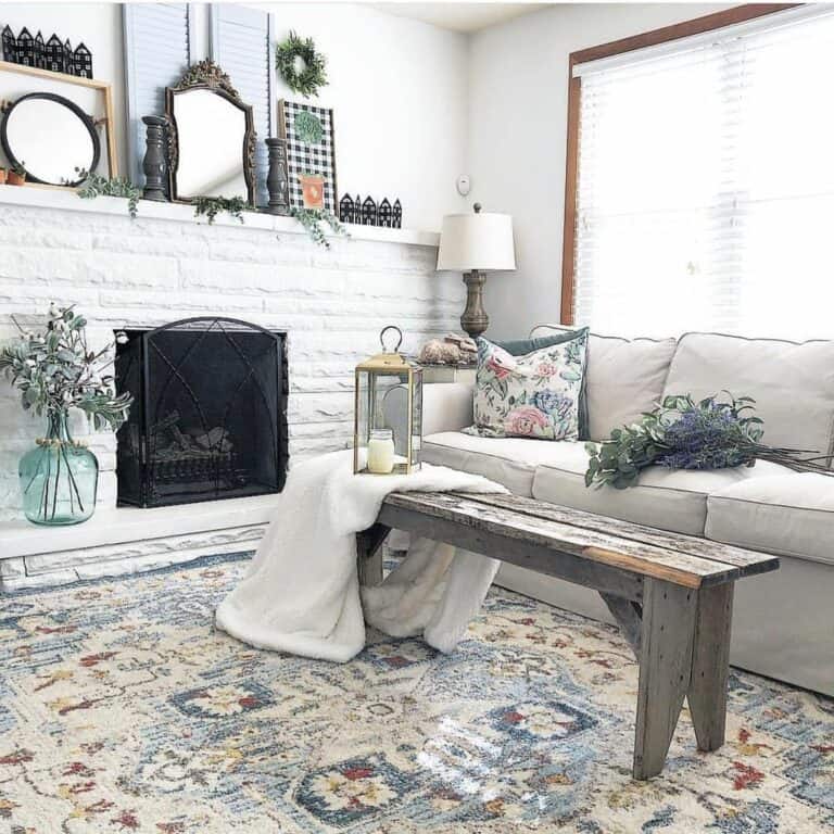 Beige Sofa and Patterned Rug in Farmhouse Living Room