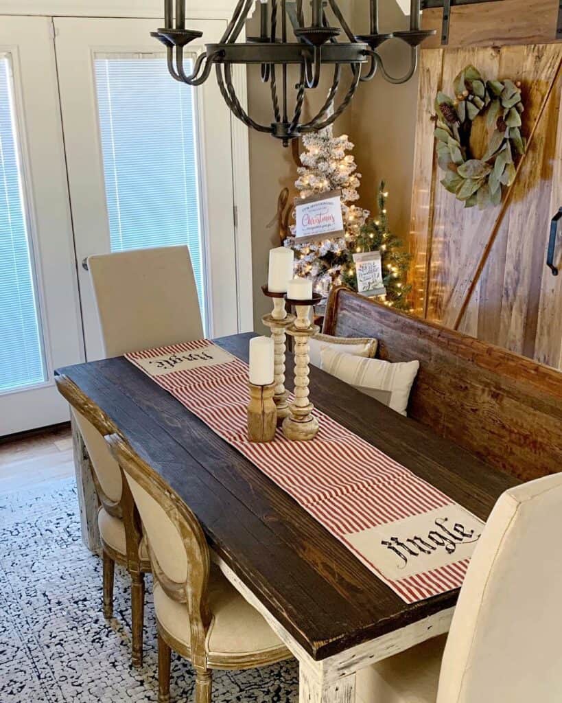 Black Farmhouse Chandelier Over Distressed Table