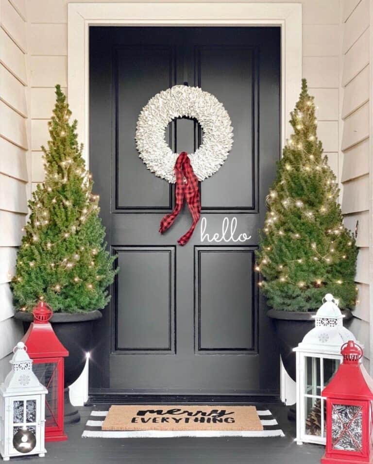 Black Front Door With White Christmas Wreath
