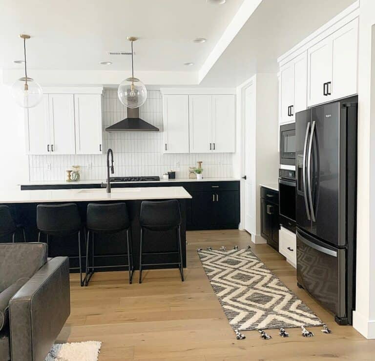 Black Kitchen Island With Glass Globe Pendant Lighting