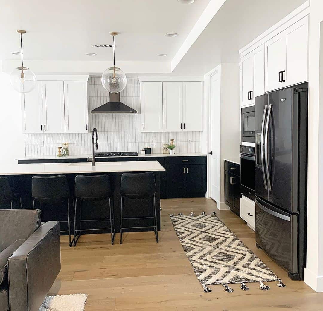 Black Kitchen Island With Glass Globe Pendant Lighting - Soul & Lane