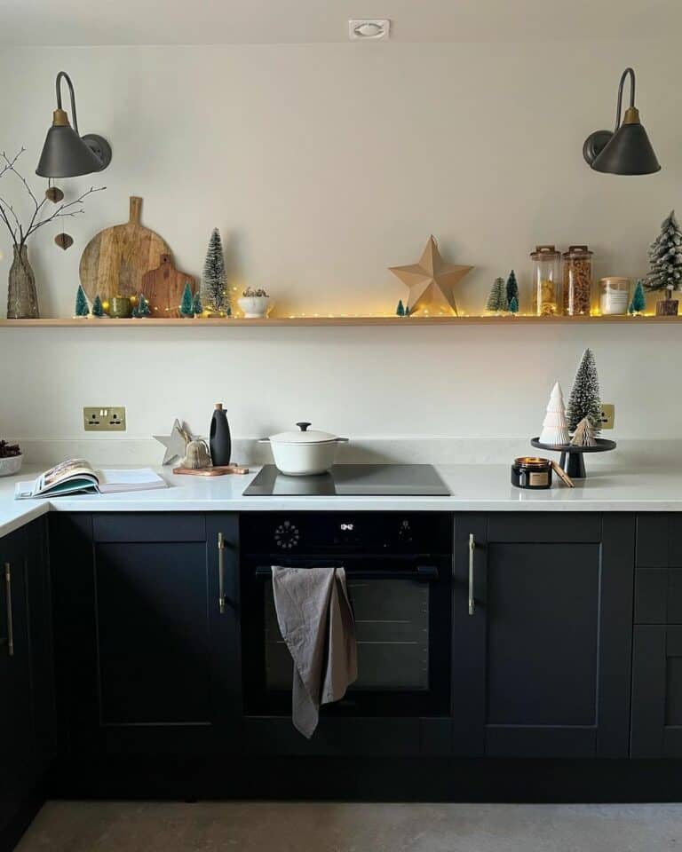 Black Sconce Over White Countertop