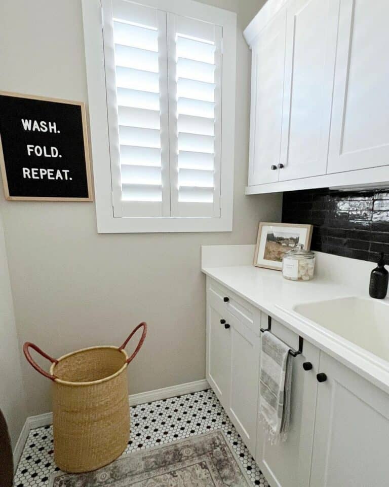 Black Subway Tile Backsplash and White Cabinets