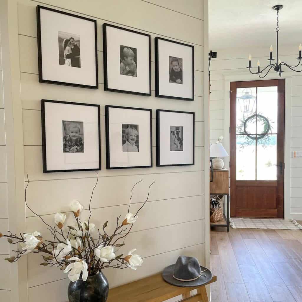 Black Wall Gallery in White Shiplap Entryway