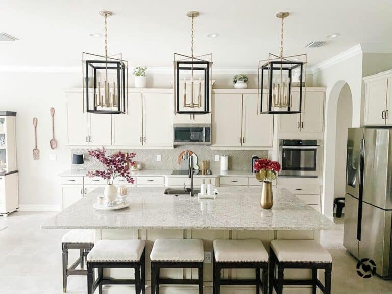 Black and Gold Lighting Over Kitchen Island