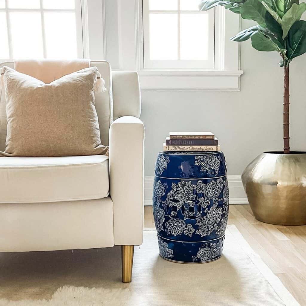 Blue Barrel End Table with White Sofa