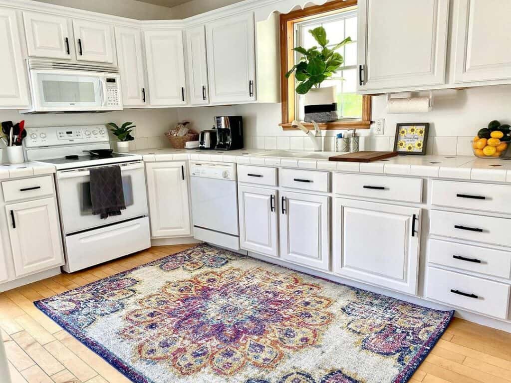 Blue Floral Rug and Black Kitchen Hardware Ideas