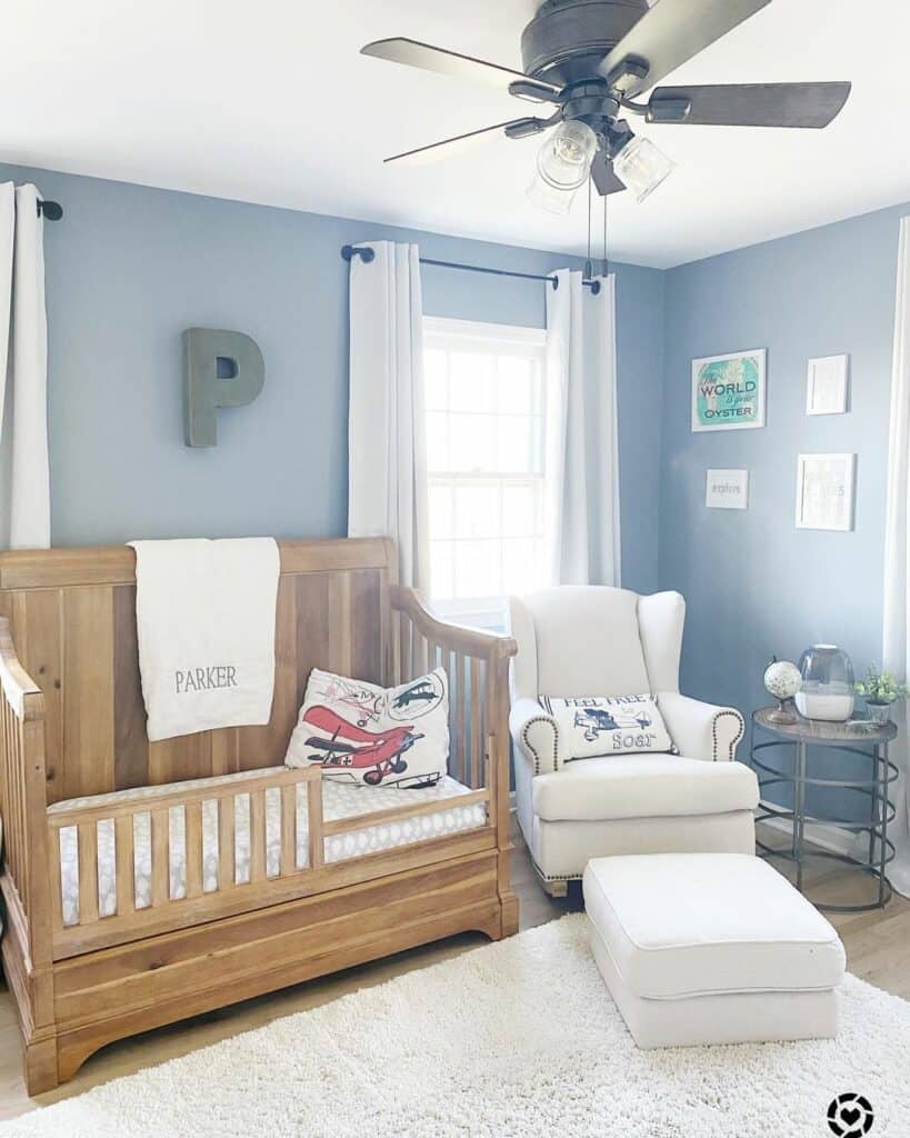 Blue Toddler Boy Room with Wooden Bed