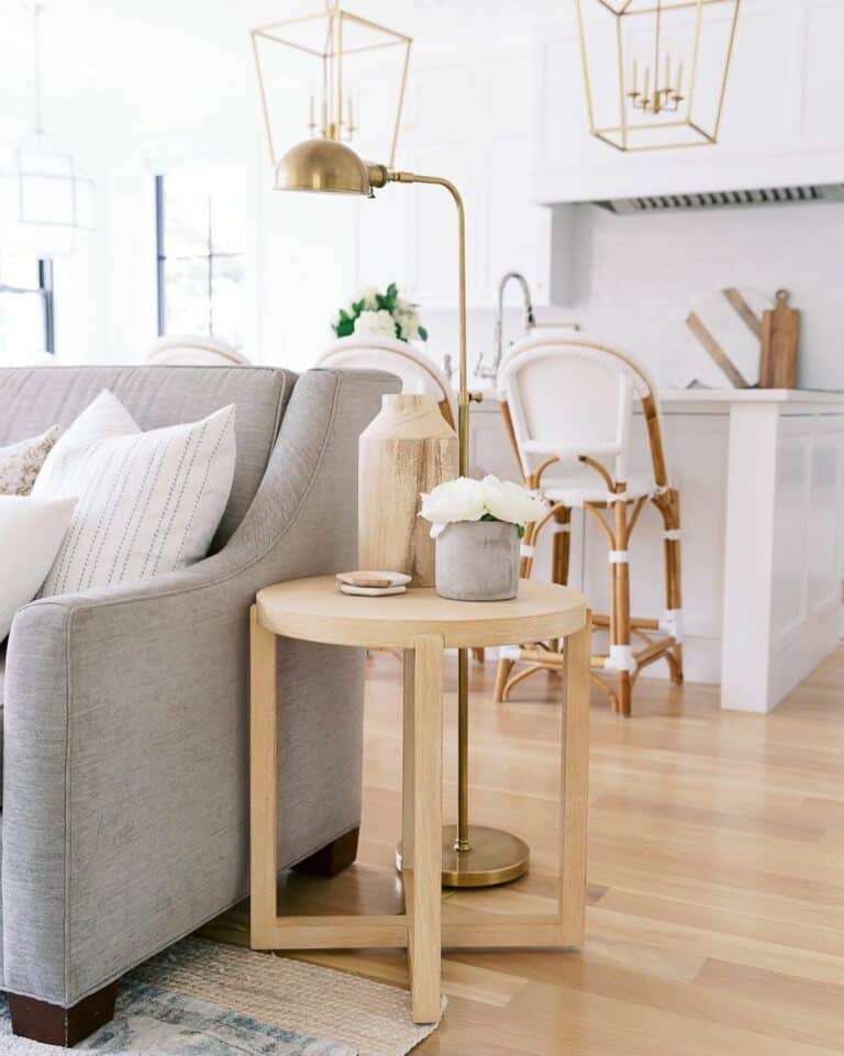 Brass Floor Lamp Over Round End Table