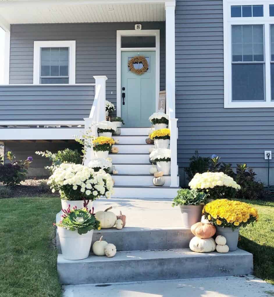 Bright Floral Walkway With Cement Front Steps