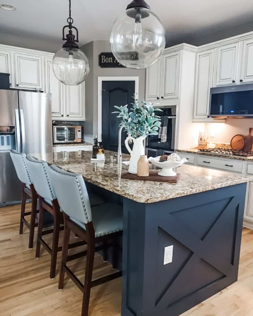 Bright Kitchen With a Deep Blue Island