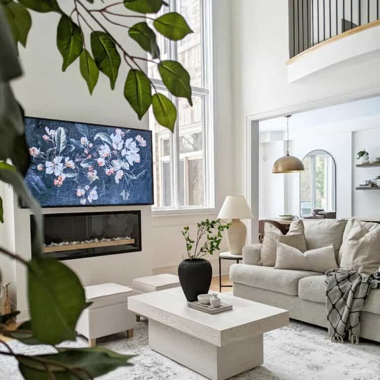 Bright Living Room With Large TV Over Sleek Fireplace
