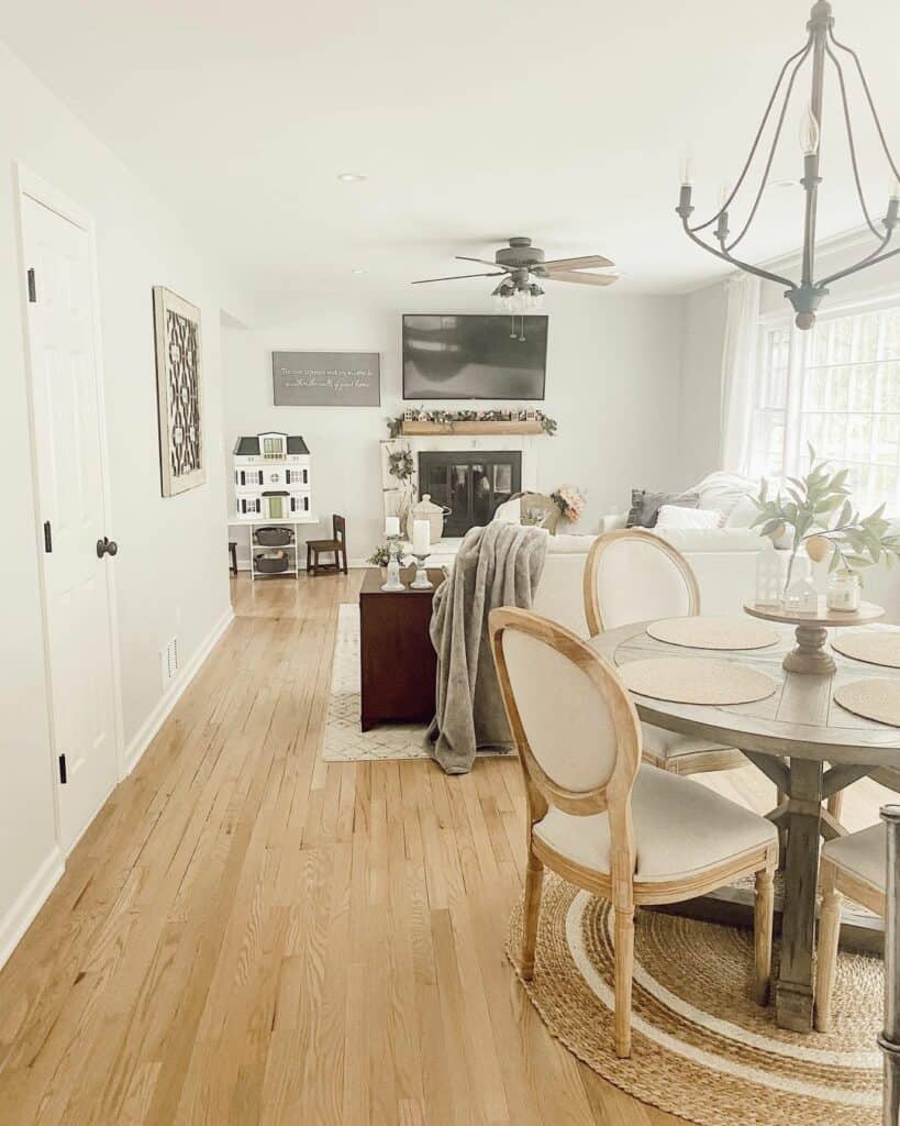 Bright Living Room With TV Over Mantel