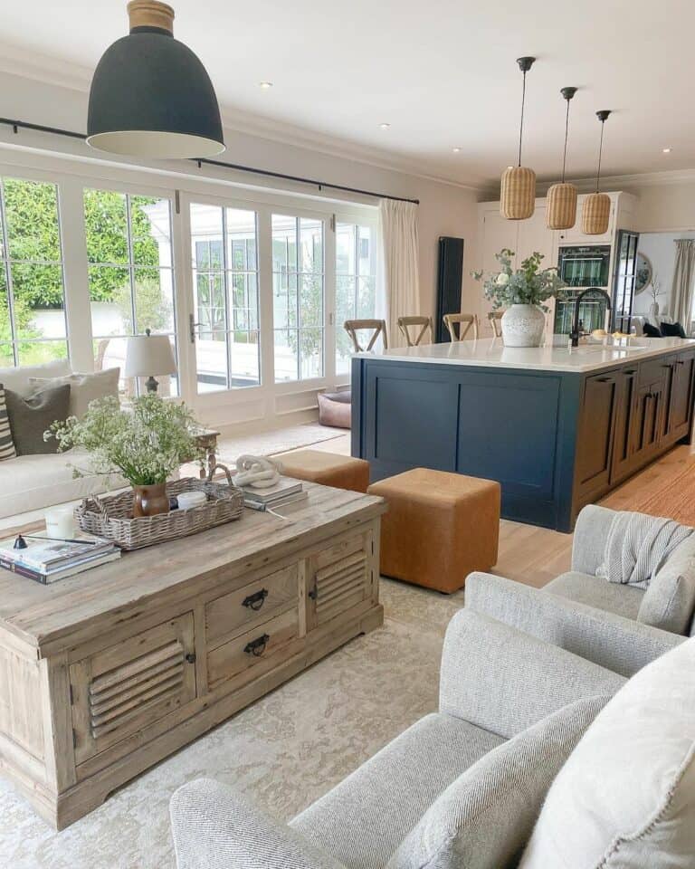 Bright White Farmhouse Kitchen With a Blue Island