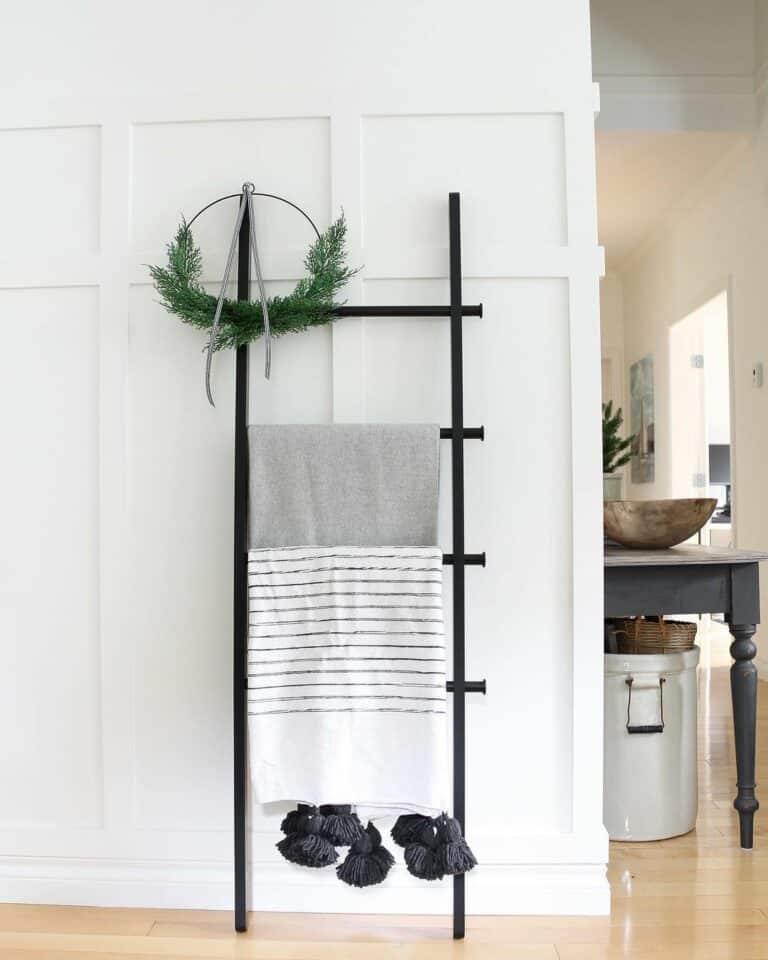 Chic Monochromatic Design with Blanket Ladder
