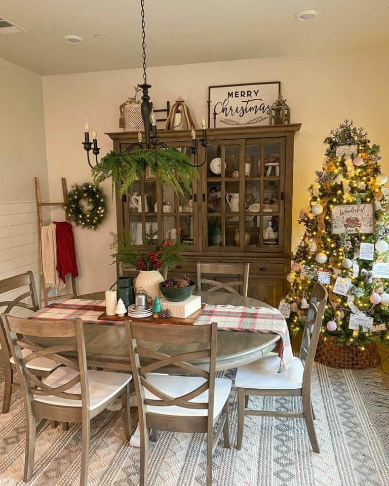 Christmas Tree Stands Beside Wooden Hutch