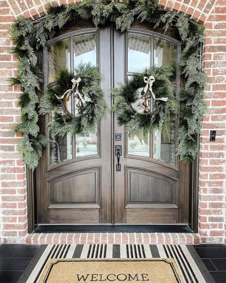 Christmas Wreaths With White Bows and Gold Bells